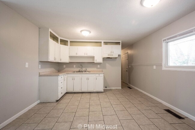 Building Photo - Coming Soon – Close to Everything You Actually Want to Do