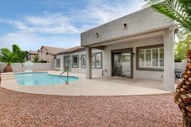 Building Photo - 4 bedroom, 3-bath home with a Pool!