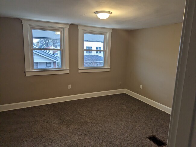 Bedroom 1 overlooks street. - 1042 Cameron St