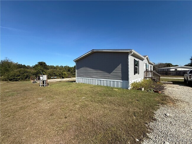 Building Photo - 5469 W Grovepark Rd