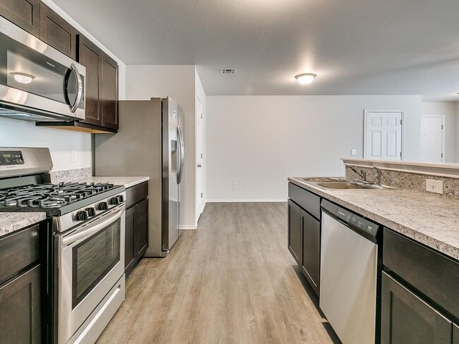 Building Photo - NOW PRE-LEASING — Low-Maintenance Living ? 3BR | 2BA Duplex in Redstone Ranch