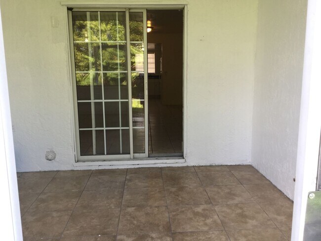 Building Photo - SOUTHEAST ORLANDO - 3BR/2.5BA TOWNHOME