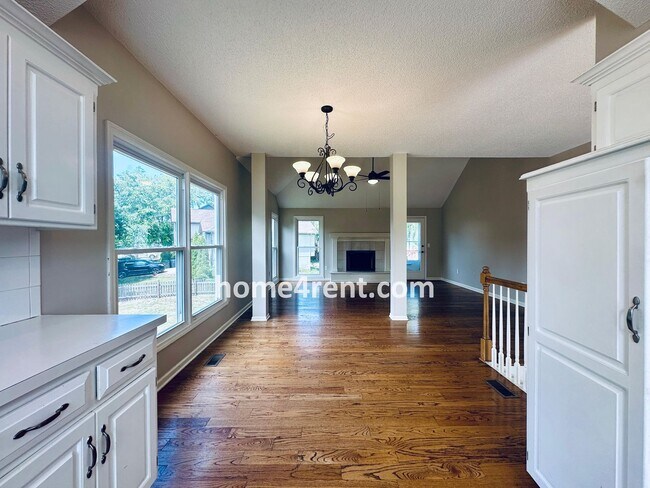 Building Photo - Brand New Paint, Wood Floors, Walkout Fini...