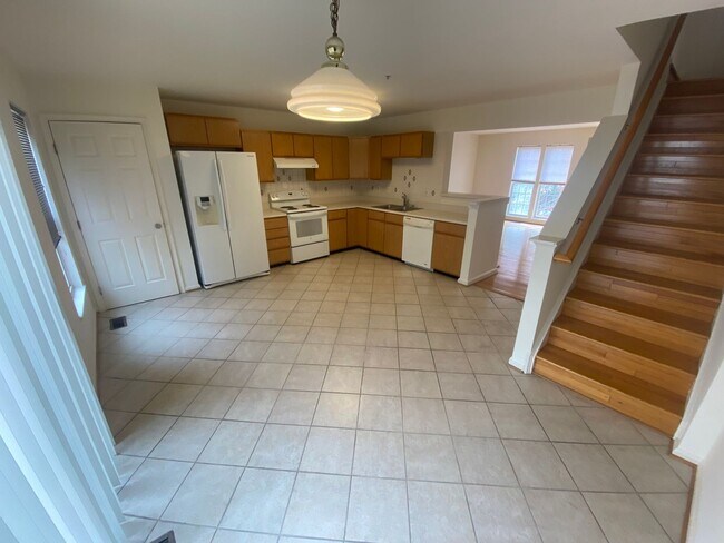 Building Photo - Application Fee Waived For Fall! A spacious three bedroom, two and one half bath townhouse locate...