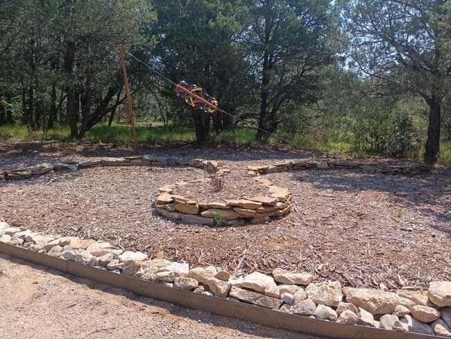 Building Photo - COZY HOME IN THE BEAUTIFUL TOWN OF TIJERAS | Showings available NOW!!