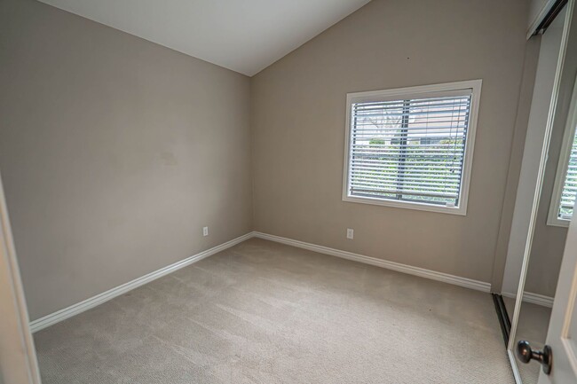 Building Photo - COMING SOON! Charming 2-Bedroom Home with a Versatile Loft in The Bungalows of Valencia!