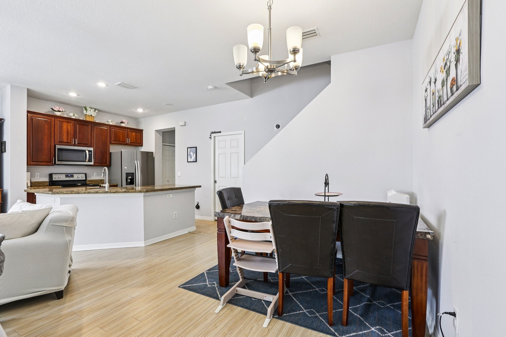 Family room (pic 2) / kitchen - 7435 Arlington Grove Cir