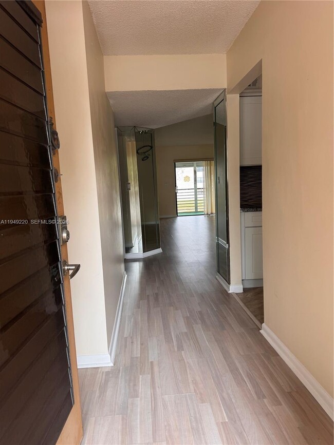 Building Photo - 4950 E Sabal Palm Blvd