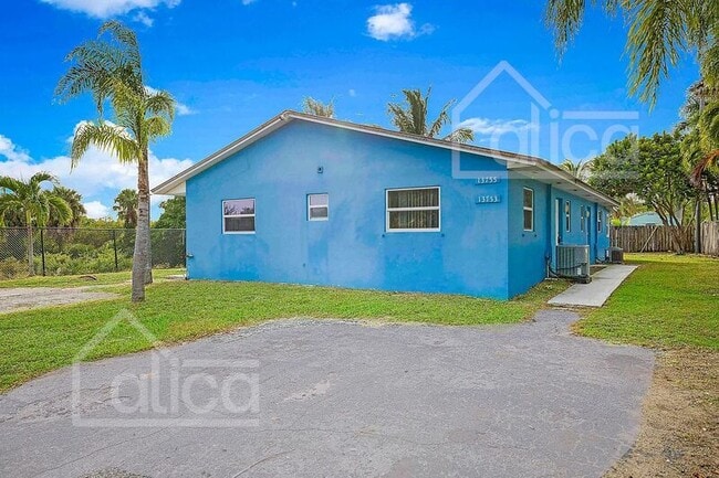 Building Photo - 13753 Oleander Ave