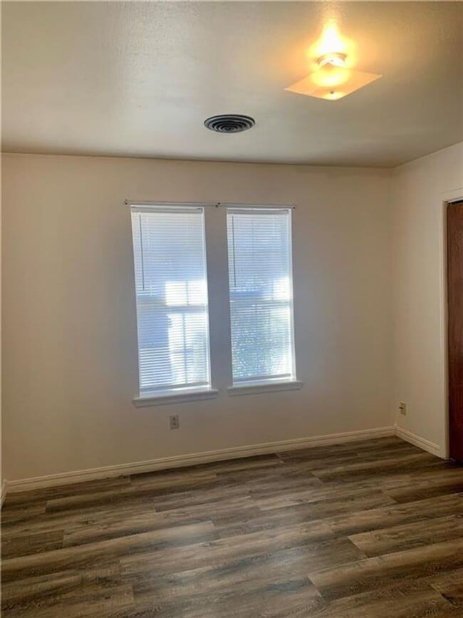 Building Photo - Charming Home with Open Kitchen, Fireplace & 2-Car Garage