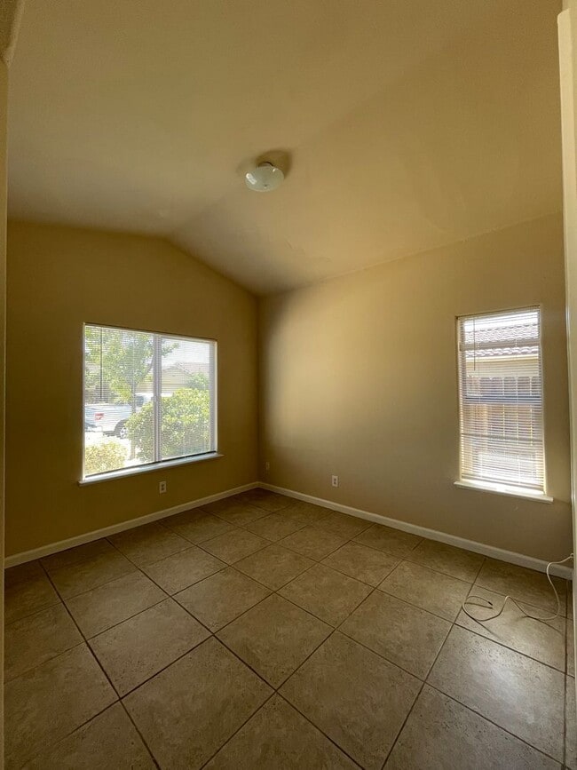 Building Photo - Available Now! Stunning 4 Bedroom, 3 Bathr...
