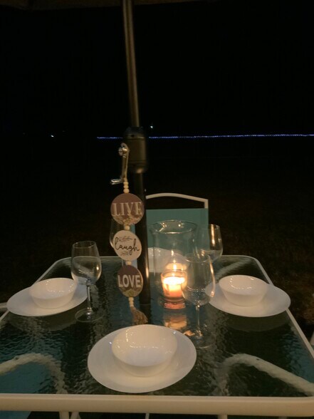 2x1 outside sitting patio with oversized umbrella - 2440 Manasota Beach Rd