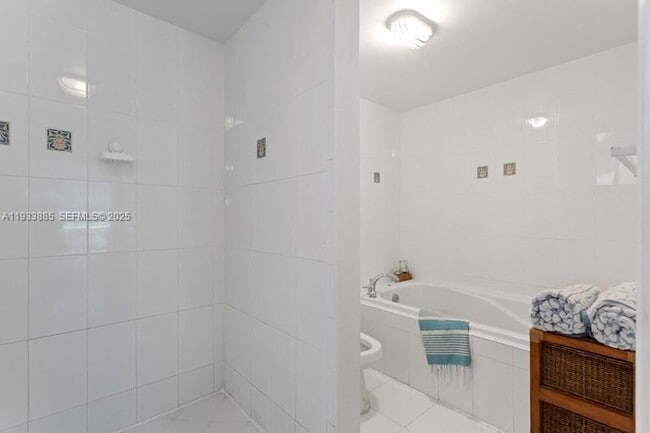 Building Photo - 8888 Collins Ave