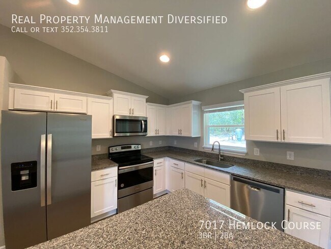 Building Photo - 7017 Hemlock Course
