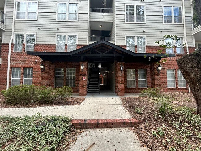 Building Photo - Walk to UF! Spacious & Furnished 3BD Condo...