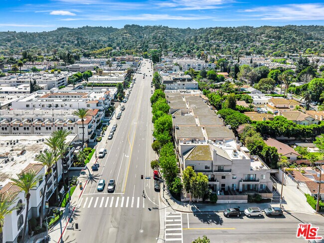 Building Photo - 4477 Woodman Ave