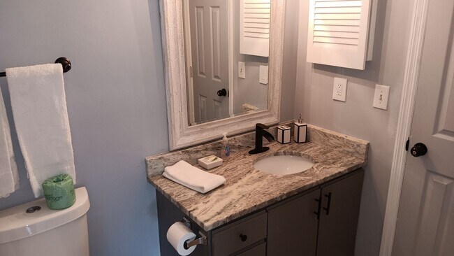 Building Photo - Furnished Two-Bedroom, Two-Bath Townhome i...