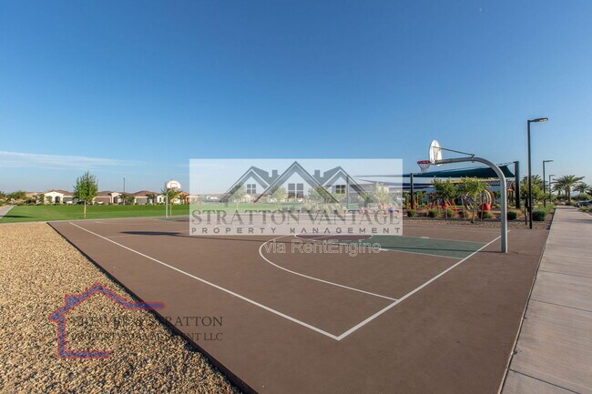 Building Photo - 9638 E Tesla Ave