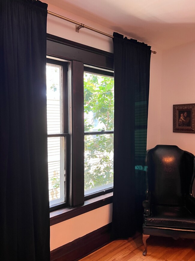 Heavy velvet curtains add the luxurious feel. - 2424 Stevens Ave