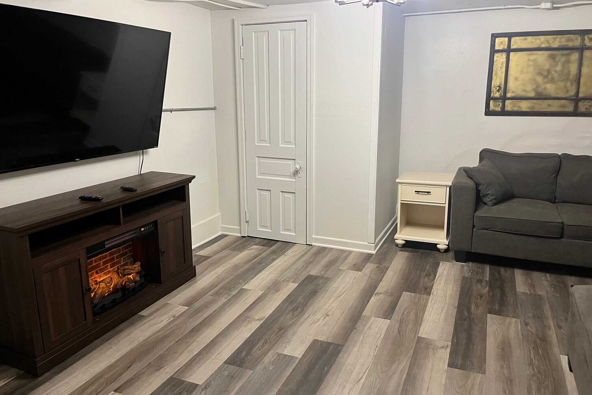 Lower level living room (with furniture for pets) - 1540 N 10th St