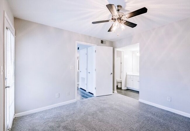Building Photo - Spacious 2-Bedroom Elite Apartment with Private Balconies & Washer/Dryer