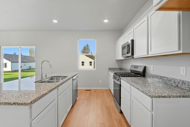 Building Photo - Spacious 4-Bedroom Home with Loft, 3 Baths & 3-Car Garage
