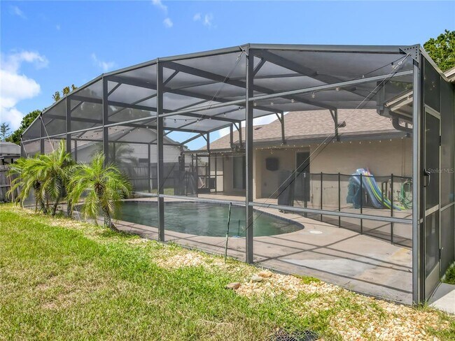 Building Photo - 9134 Sabal Palm Cir