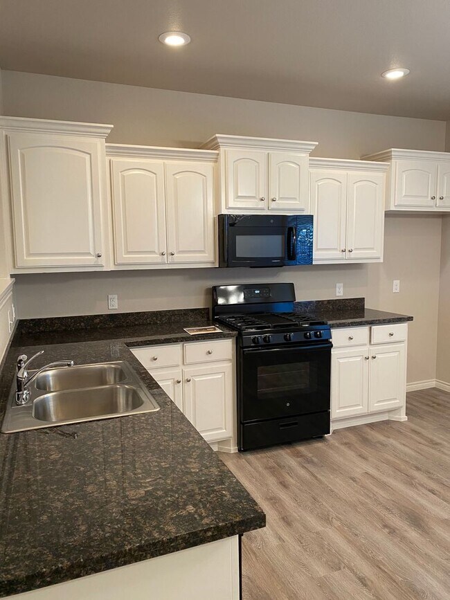 Building Photo - Beautiful Custom Brick Home "The Remington" Open Concept with huge backyard! JULY 1ST!