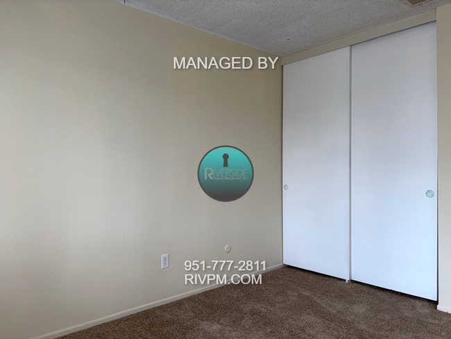 Building Photo - DISCOVER YOUR DREAM CONDO IN COLTON!!!