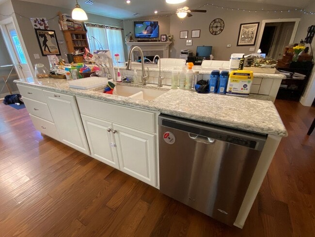 Building Photo - FENCED BACKYARD! BONUS ROOM/OFFICE! SAFE ROOM! THREE CAR GARAGE