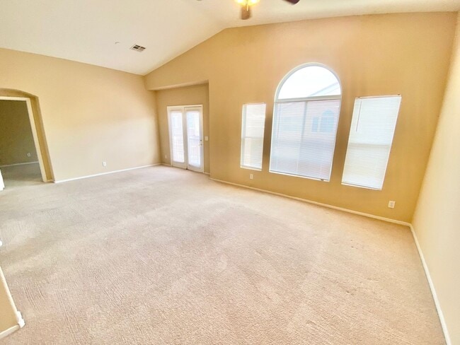 Building Photo - OVELY  2 BED ROOM 2 BATHROOM TOWNHOES LOCATED IN A GATED COMMUNITY IN HENDERSON