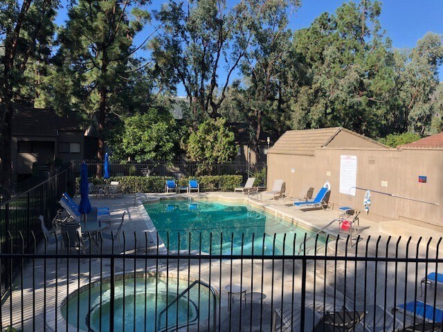 Building Photo - Lake and Golf Course View- Remodeled Condo w/ 2 Car Garage!