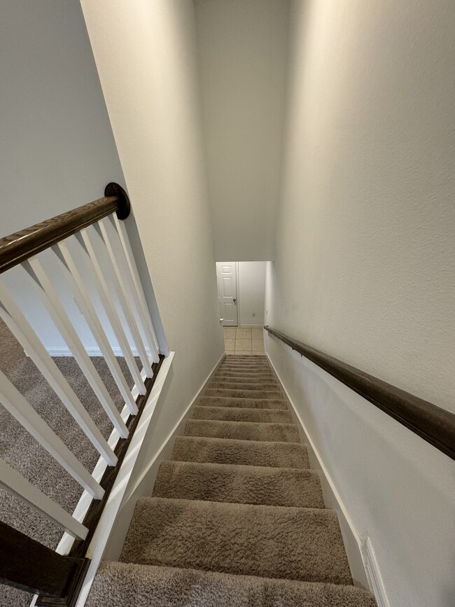 Stairs leading to bedrooms & balcony - 9987 Randal Walk St