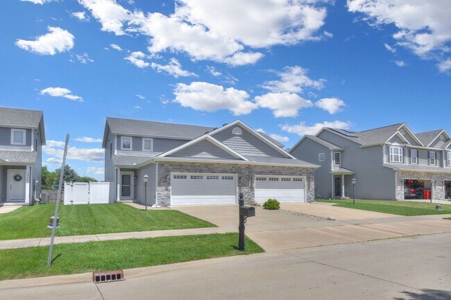 Building Photo - Spacious 4-Bedroom, 3.5-Bathroom Townhome & 2-Car Garage-West Champaign