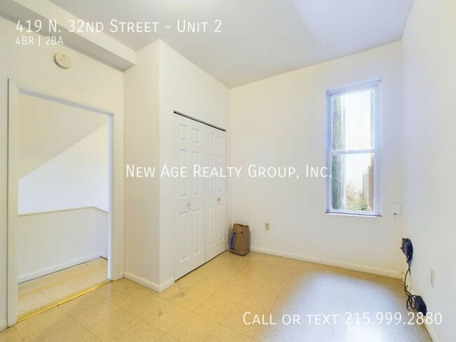Building Photo - Spacious, Bi-level Apartment Available at ...