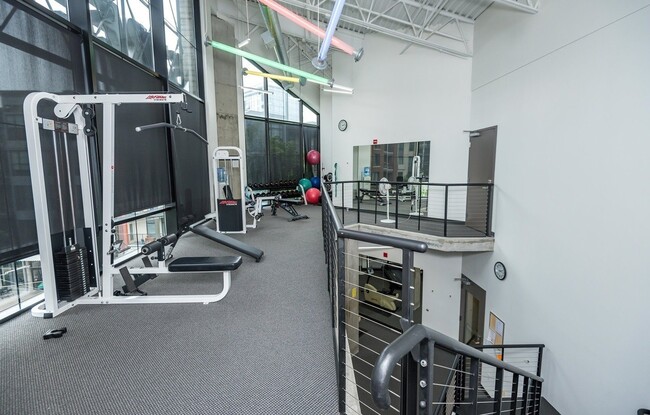 Building Photo - 1/2 Month FREE: Rare Streetcar Lofts Gem w/ Parking & Utilities