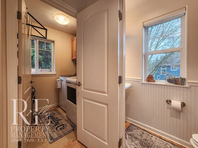 Building Photo - Light-Filled View Home with Vaulted Ceilings & Warm Wood Finishes