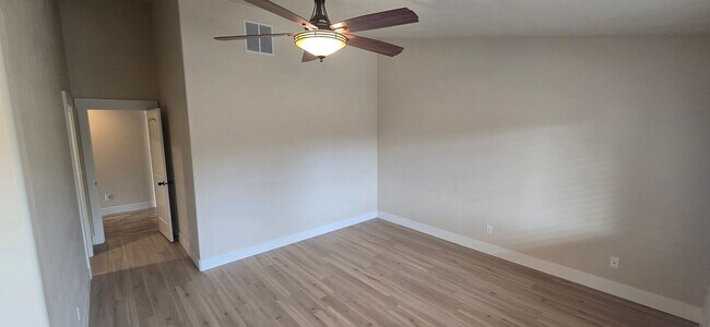 Building Photo - THREE-CAR GARAGE! This charming home offers 3 bedrooms, plus an office/rec room, and 2 bathrooms.
