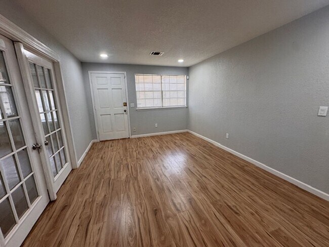 Building Photo - Newly remodeled 3 bed 1 bath garage conversion with monitored security!