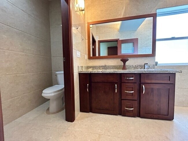 Building Photo - Like New Single Family Home in McCully!