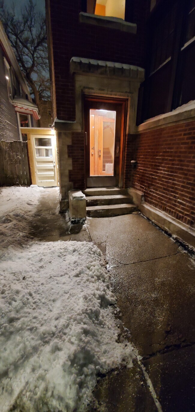 front door in winter - 6442 N Glenwood Ave