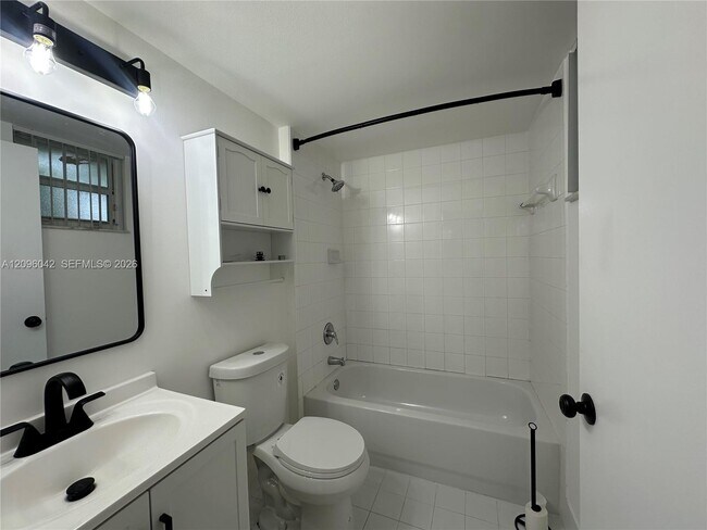 Building Photo - 3241 Sabal Palm Manor