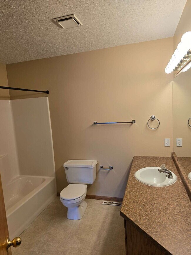 Building Photo - "Charming 3-Bedroom Fargo Home with 2 Full...