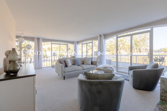 Building Photo - 2BR/2BA Waterfront Corner Condo!  Storage!  Covered Parking! FOUNDATION