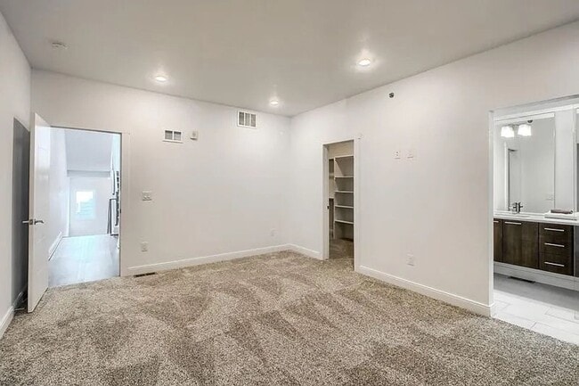 Building Photo - Modern LoHi Living with Rooftop Deck & City Views!!