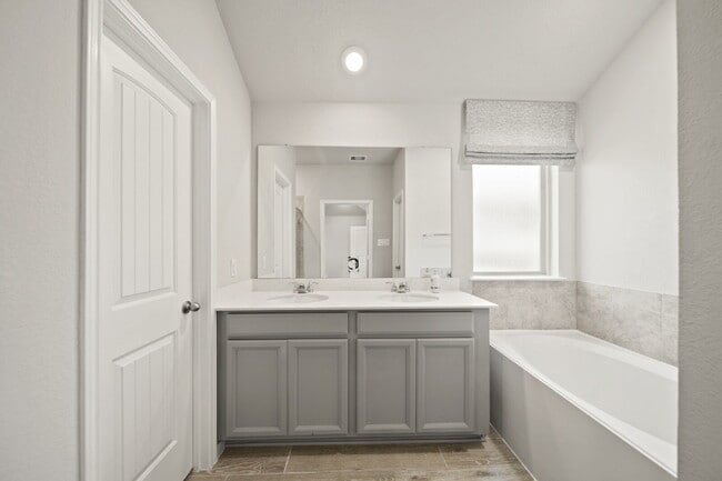 Building Photo - "Charming 4-Bed Sanctuary on Gentle Breeze Lane - Spacious 1861 Sq. Ft. Home with 2 Full Baths in...