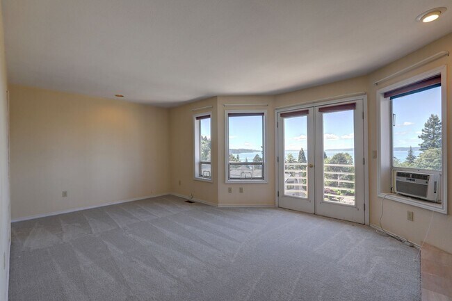 Building Photo - 4+ Bedroom with Great Entertaining Wrap Around Decks with VIEW of PUGET SOUND!!