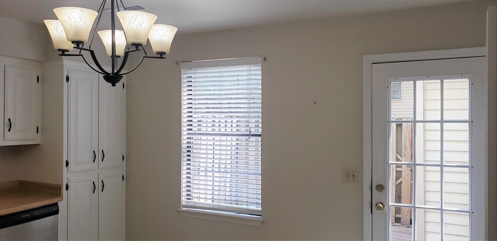 New light fixture in kitchen. - 1205 Brentwood Pt