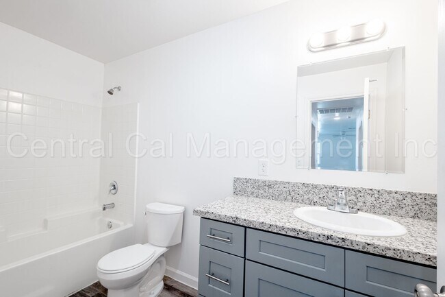 Building Photo - 129 E 8th St