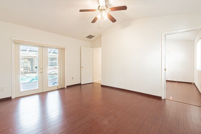 Building Photo - 5-Bed Home With Private Heated Pool & Large Yard - Pet Friendly!